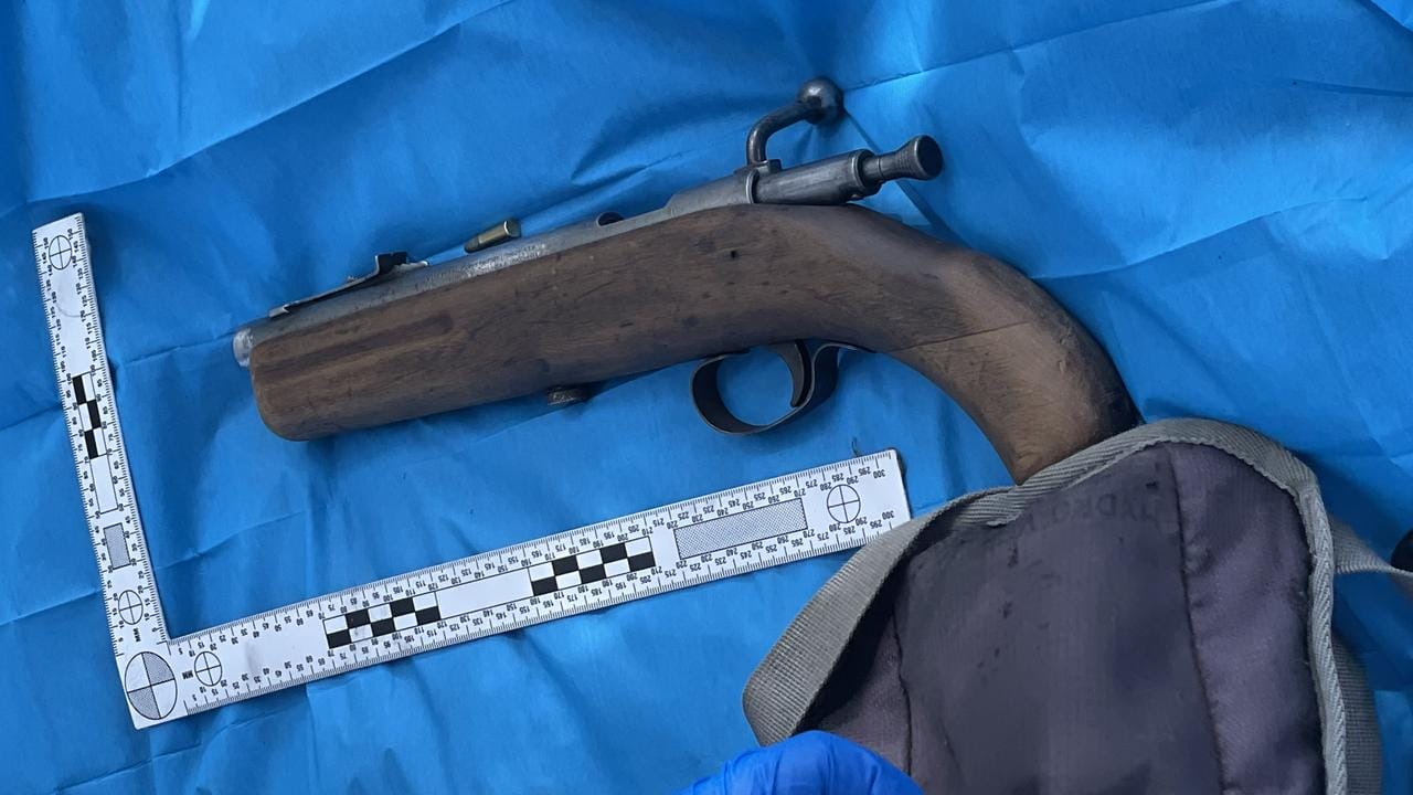 Tasmanian woman charged after allegedly opening fire on police during search warrant 663b00b95101f8b6bf63878d01ac3a8d