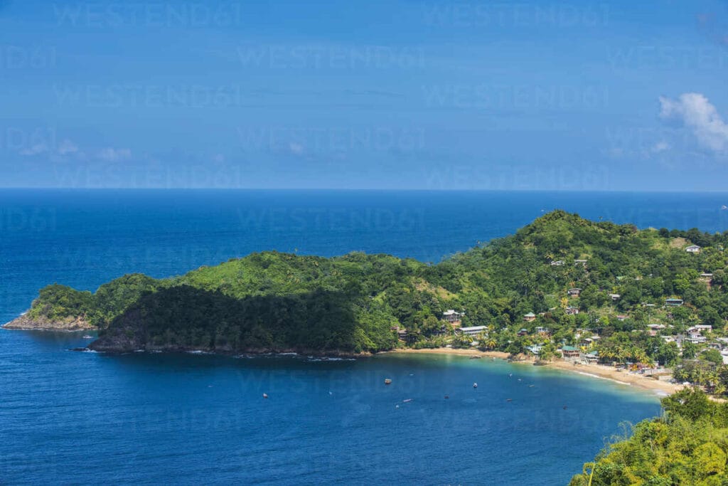 American Tourist Found Dead in Tobago Village — Suspect Arrested aerial view of castara bay against blue sky at tobago caribbean RUNF03183