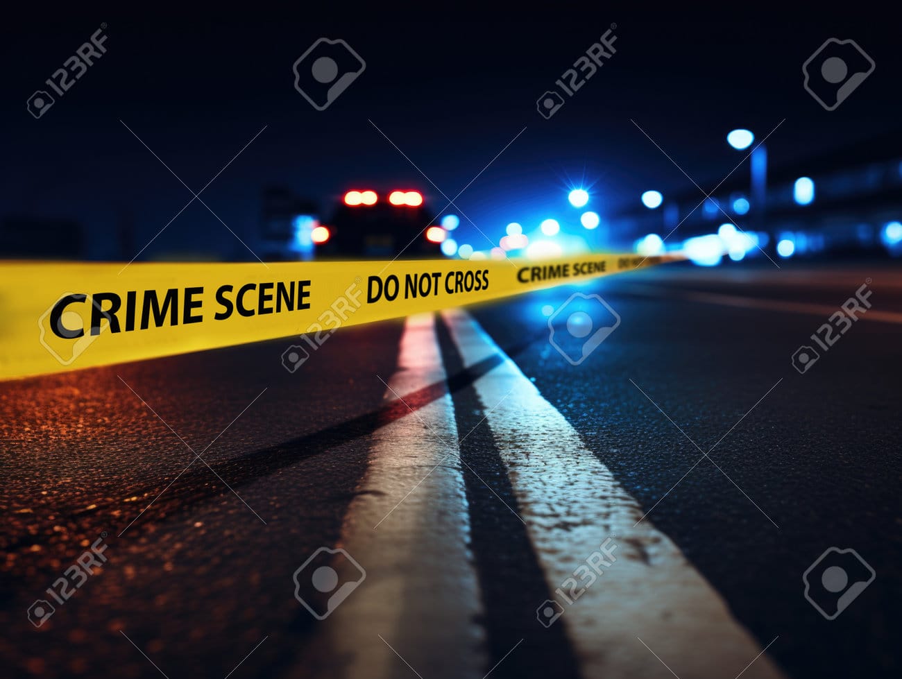 TikToker Arrested After Allegedly Killing Man During Livestream 217587679 crime scene tape across a dark street at night