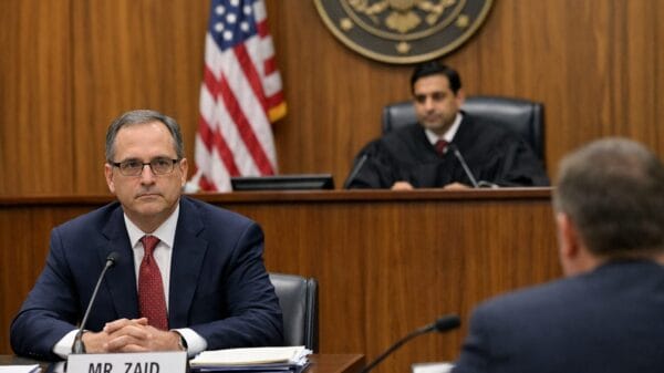 Federal Court Temporarily Blocks Trump Administration from Revoking Whistleblower Lawyer’s Security Clearance ChatGPT Image Dec 25 2025 12 30 18 AM