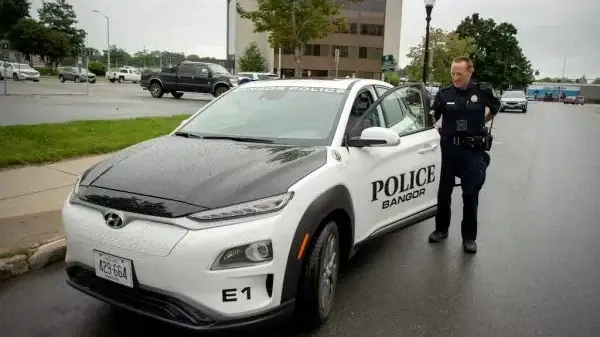 Maine Man Arrested After Allegedly Breaking Into Apartment, Unwrapping Gifts and Napping on the Couch Electric Police Car E LCO 1 600x379 1