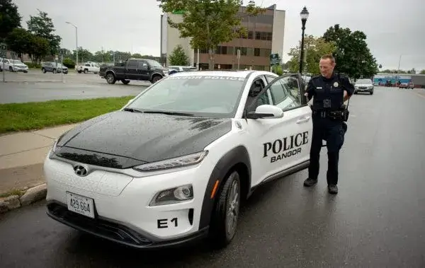 Maine Man Arrested After Allegedly Breaking Into Apartment, Unwrapping Gifts and Napping on the Couch Electric Police Car E LCO 1 600x379 1