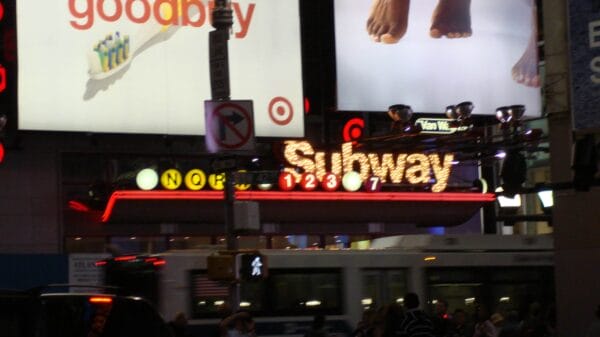 New York High School Senior Arrested for Setting Subway Passenger on Fire Times Square – 42nd Street NYC Subway Station entrance at night 1