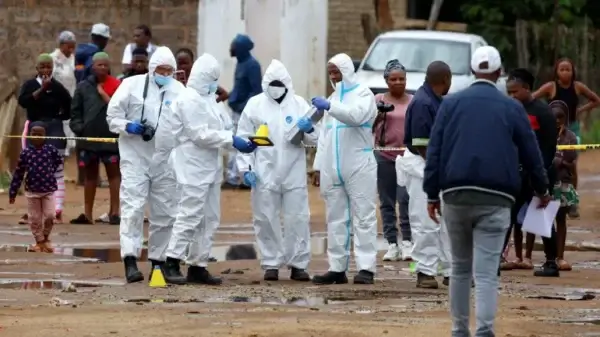 11 Arrested After Deadly Tavern Shooting Shocks South African Community reuters 694ce296 1766646422