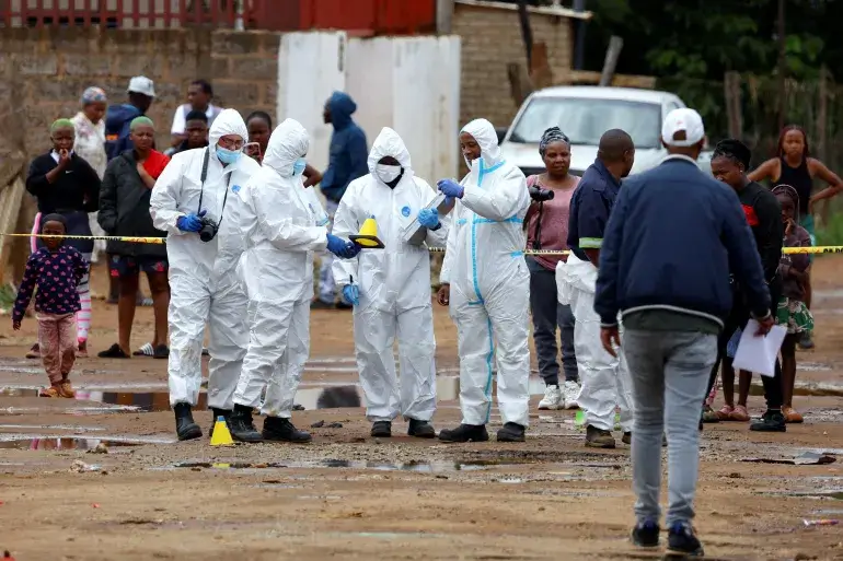 11 Arrested After Deadly Tavern Shooting Shocks South African Community reuters 694ce296 1766646422